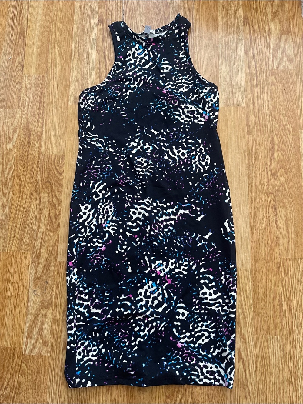 Sleeveless Black Animal Print Sheath Dress with Colorful Accents